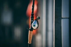 Quantum Energy S3 Baitcasting Reel -Sport Fishing Shop energy bc reel and rod side lifestyle